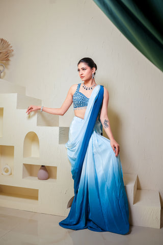 Blue Crape Saree Adorned With Sequins And Pearls